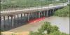 Traffic at World Trade International Bridge temporarily suspended after buoy barrier accumulates near supports
