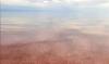 Martian sands in Kyrgyzstan? The mind-bending secret behind Lake Issyk-Kul's vibrant red beach