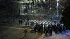 Riot police face Argentina fans throwing bottles after World Cup final defeat