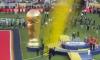 Bitter Argentina players turn their backs to Spain's World Cup trophy lift after violence marred winners' celebrations - as lip-reader reveals what furious star said to winning captain Rodri during brawl