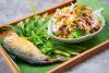 Thai rice vermicelli with fried mackerel and spicy herb salad