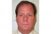 A most-wanted fugitive appears to have been secretly working as a biotech executive