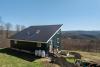 Perched high, this solar-powered home on 52.6 acres showcases Vermont’s natural beauty