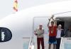 Rodri holds up trophy: Plane carrying Spain's World Cup winning team lands in Madrid
