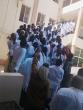 Africmed Provides White Coats for 74 UTG Medical Students