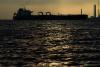 Tehran attacks Gulf states, says 2 tankers in Hormuz on fire
