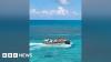 Video appears to show confrontation between Chinese and Philippine navy vessels