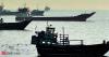 Iran's Guards say two tankers hit in Hormuz, US defence systems targeted in Bahrain