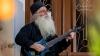 “Frets are necessary, like a baby walker that a small child uses to learn to walk. But after a certain point they can become restrictive”:How a Greek orthodox priest went viral by turning church hymns into fretless eight-string metal ragers