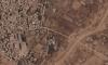 Photos show Israel building miles-long earthen barrier inside area it holds in Gaza