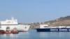Dramatic moment 600ft ferry CRASHES head-first into cargo ship off Greek holiday island