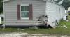 Crash on Beach Highway damages house in Ellendale