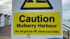 Warning to beachgoers as people trapped near historic structure