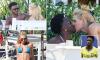 World Cup star Vinicius Jr packs on the PDA with his stunning girlfriend in Rio de Janeiro as he celebrates chin surgery success on lavish vacation