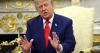 Trump downplays Chinese election interference five days after describing breach of historic proportions