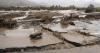 The death toll from torrential rains and floods in Chile rises to thirteen.