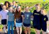 Gentry students volunteer to prepare agriculture learning fields for new school year
