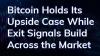 Bitcoin holds its upside case while exit signals build across the market