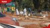 Nairobi cab driver captures bizarre ritual of men burning flowers over grave at Lang’ata Cemetery