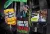 Welcome lobby: Palestinian flags, gas tax signs – and another billboard banned at Adelaide Airport
