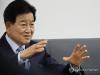 Unification minister says policy on N. Korea has shifted to peace-first approach