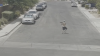 Security video captures gunman firing AR-style rifle at Las Vegas homes in broad daylight