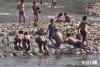 No lifeguards as children swim rivers in North Korea’s summer heat
