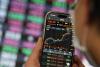 Fund managers want Taiwan to lift mobile phone ban
