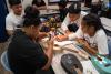 Children make ukuleles through Save the Music Program