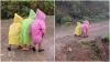 Nepal schoolchildren in raincoats walk uphill hand-in-hand, sight is too cute to miss