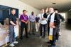 Archbishop Thomas Wenski visits WTDC to bless first shipment of lanterns to Cuba