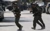 Israel pours troops into West Bank after deadly shooting