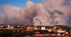 Tens of thousands of people flee raging wildfires in France and Spain