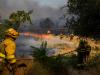 Spanish police accuse tractor driver of sparking wildfire as blazes spread