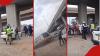 Nairobi residents save woman after her car stalls on railway as train approaches: "Kanyagia brake"