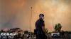 Firefighters struggle to contain Madrid wildfires, as more than 140,000 evacuated in France and Spain