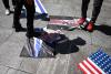 Venezuelans hold minute of silence a month after quake