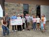 Library donations: Three businesses present $18,000 in donations to new Scott-Sebastian County Library for naming rights