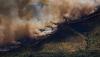 More than 250,000 people flee their homes as wildfires burn in France and Spain