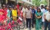 Educational scholarships distributed among indigenous community in Naogaon