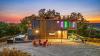 I Built a Container Home on a Clifftop That Grosses $100,000 a Year—and It’s For Sale