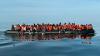 Fury as group of migrants ‘flee to UK on dinghy’ after ‘brutally’ killing man in ‘fierce’ row on French beach