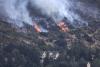 Wildfires force 267,000 to flee across France, Spain