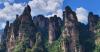 Global tourists flock to China's Zhangjiajie for cool mountain getaway
