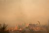 Wildfires force exodus in France, Spain