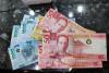 Government borrowings swell on global bond issue
