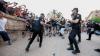 Baton-wielding cops ‘fire rubber bullets’ at anti-tourism zealots after 25,000 protesters ‘collapse streets’ of Majorca