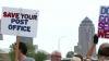 Supporters rally in Des Moines to protect public postal service and vote-by-mail