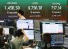 Seoul shares turn lower late Mon. morning on tech slide