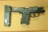 Two men charged after gun found in 505lb drug haul at sea